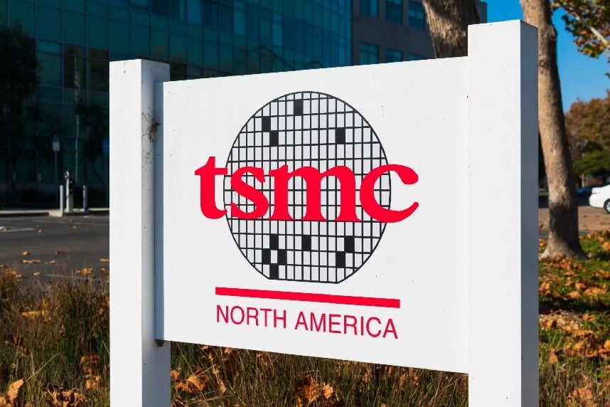 TSMC sign in front of the company&#039;s fab that will open in Arizona next month.