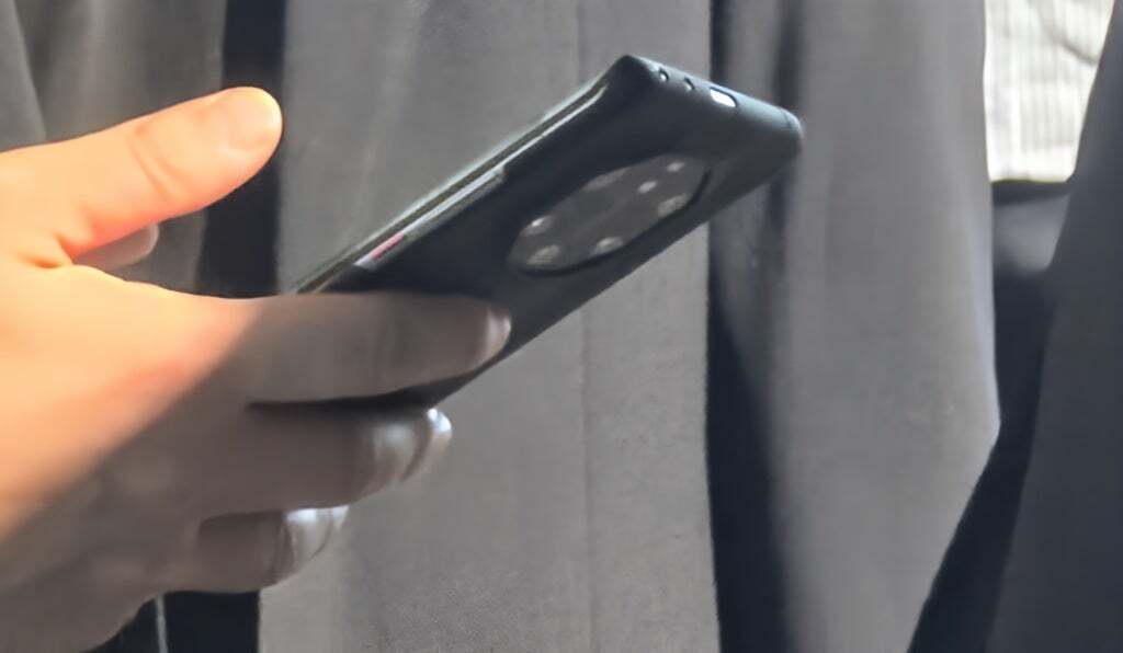 A live image of the Mate 70 Pro shows a larger power button that will include an integrated ultrasonic fingerprint sensor. Image credit-Weibo - Huawei Chairman covers his pocket so unannounced Mate 70 won't leak