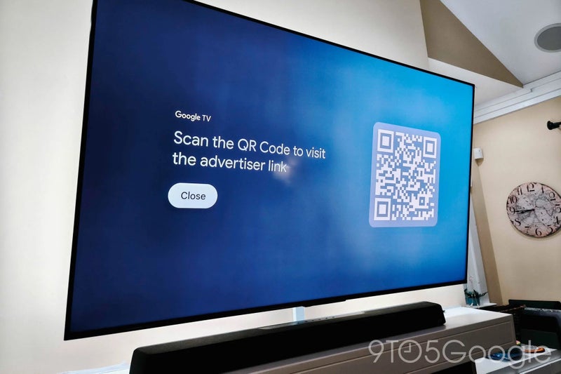 An image of Google TV displaying a QR code