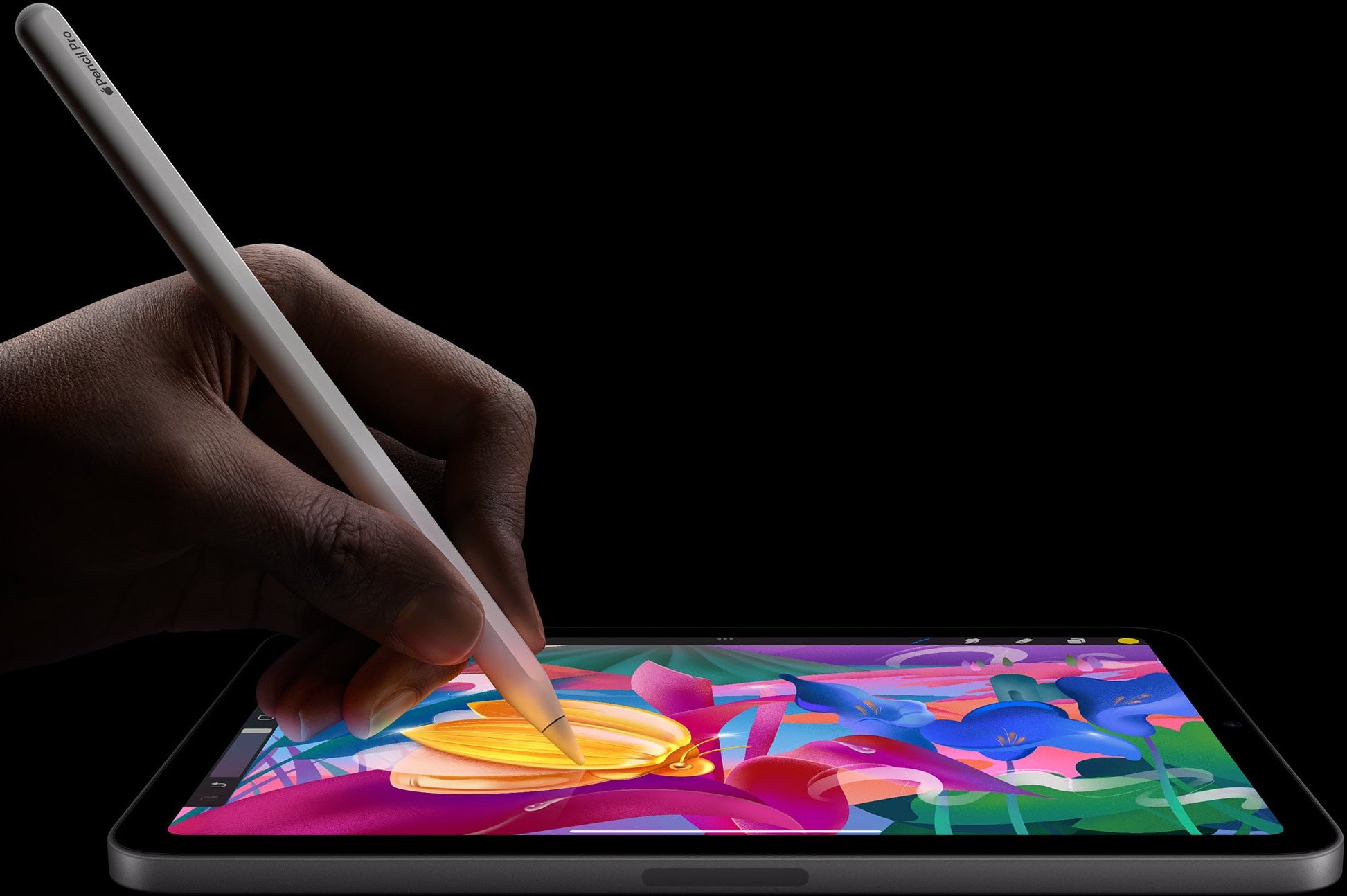 Official Apple promo image of Apple Pencil Pro being used on iPad mini