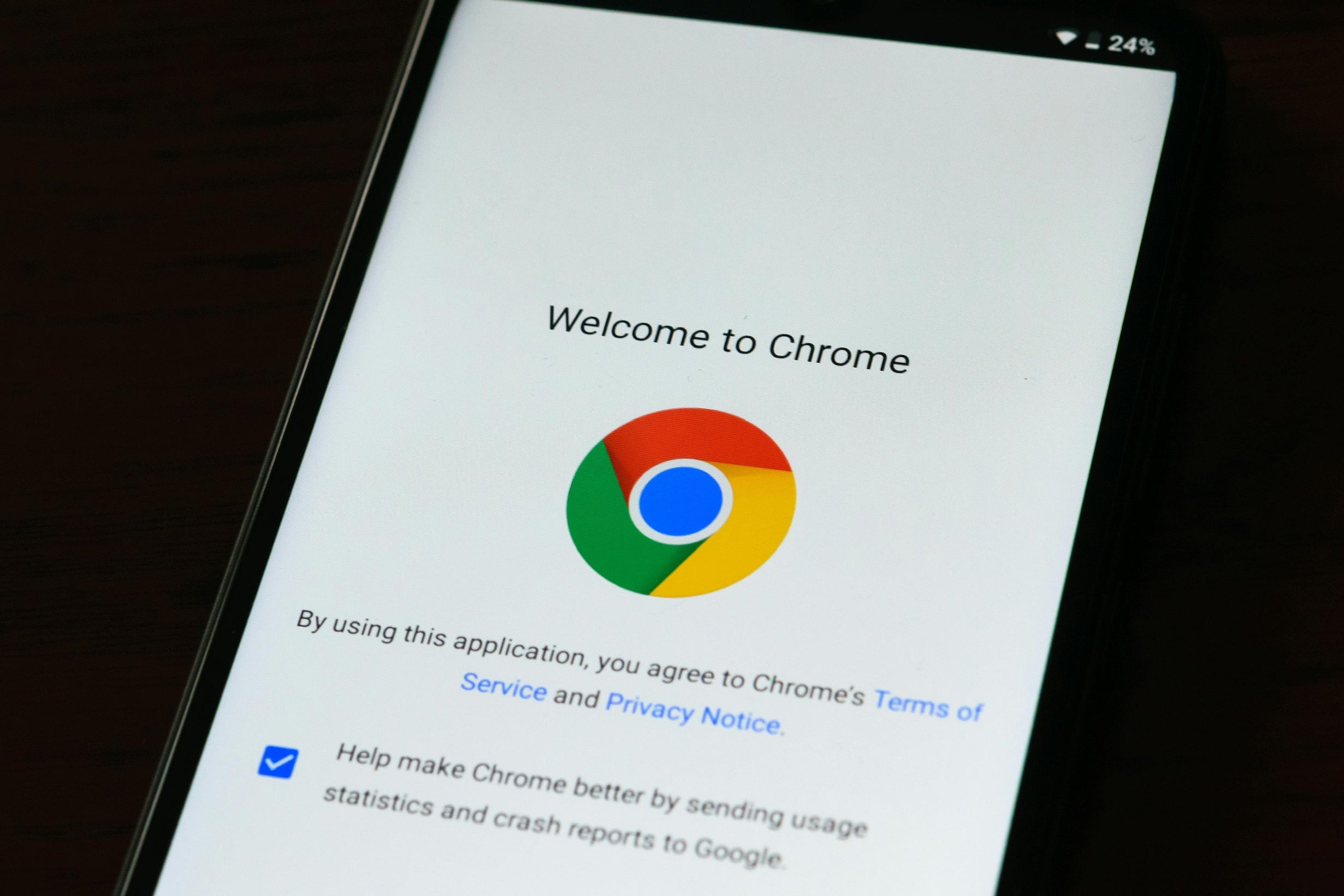 An image of a smartphone displaying the Chrome browser welcome page