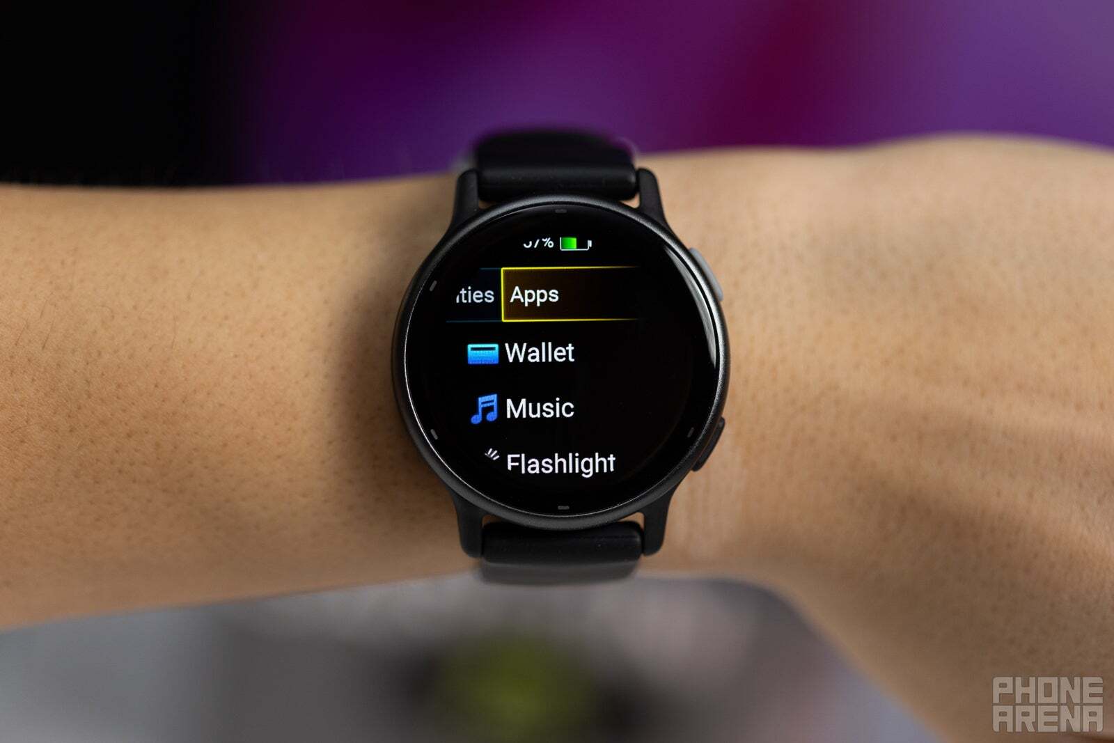 A person is wearing the Garmin Vivoactive 5 smartwatch on their hand. 