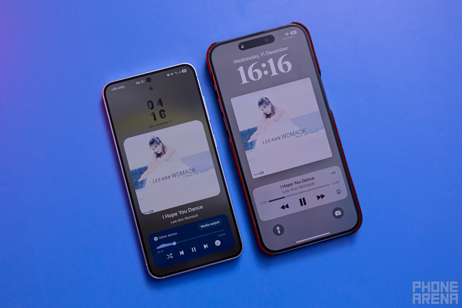 Galaxy S24 with One UI 7 and iPhone 16 Pro with iOS 18, lockscreens with album artwork visible.