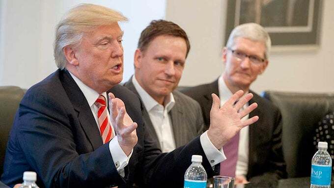 Tim Cook and Donald Trump meeting during a tech summit held during Trump&amp;#039;s first term.