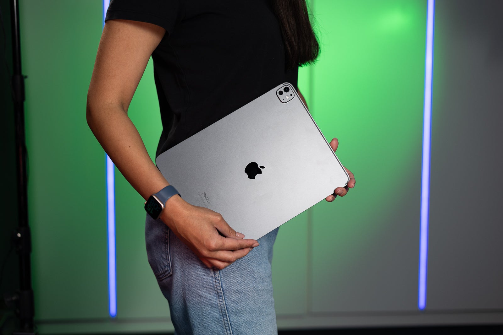 A woman holding a 2024 iPad Pro