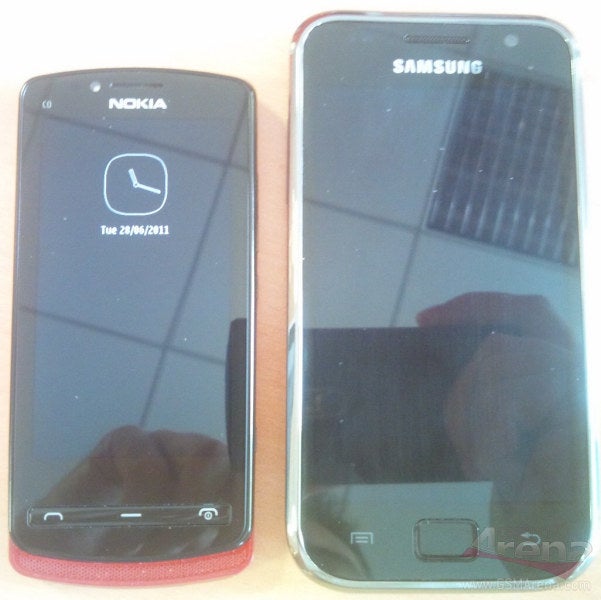The Nokia Zeta alongside the Samsung Galaxy S  - Nokia Zeta with Symbian Belle poses for the camera