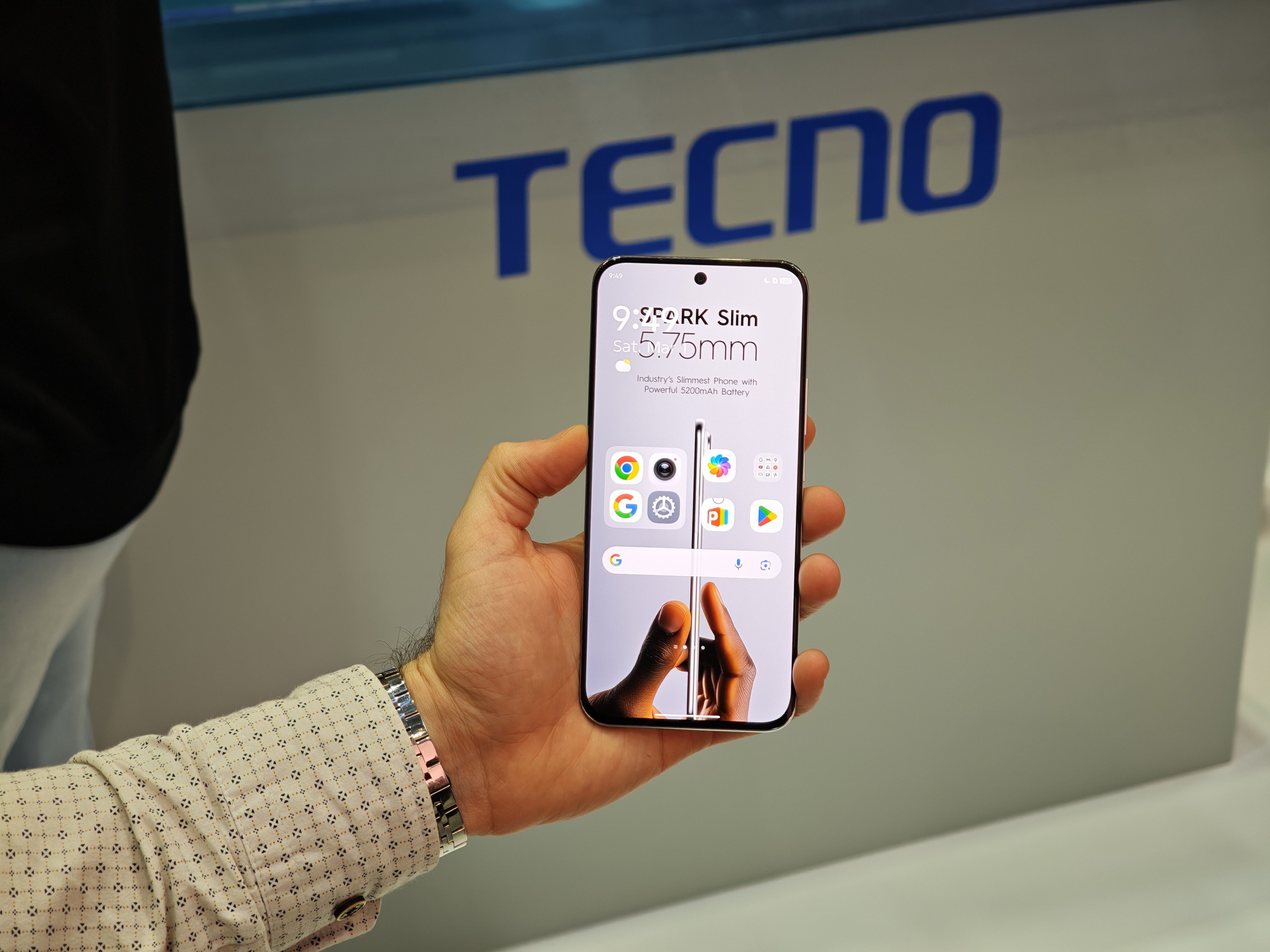 Tecno Spark Slim in hand