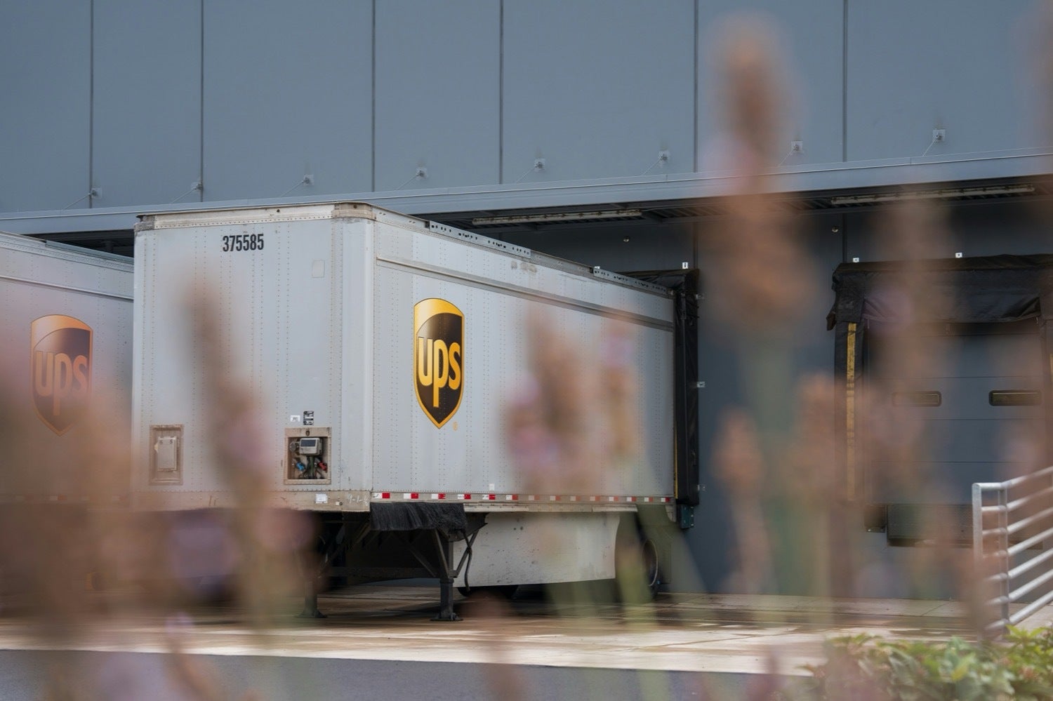 Image of a UPS truck in front of a building