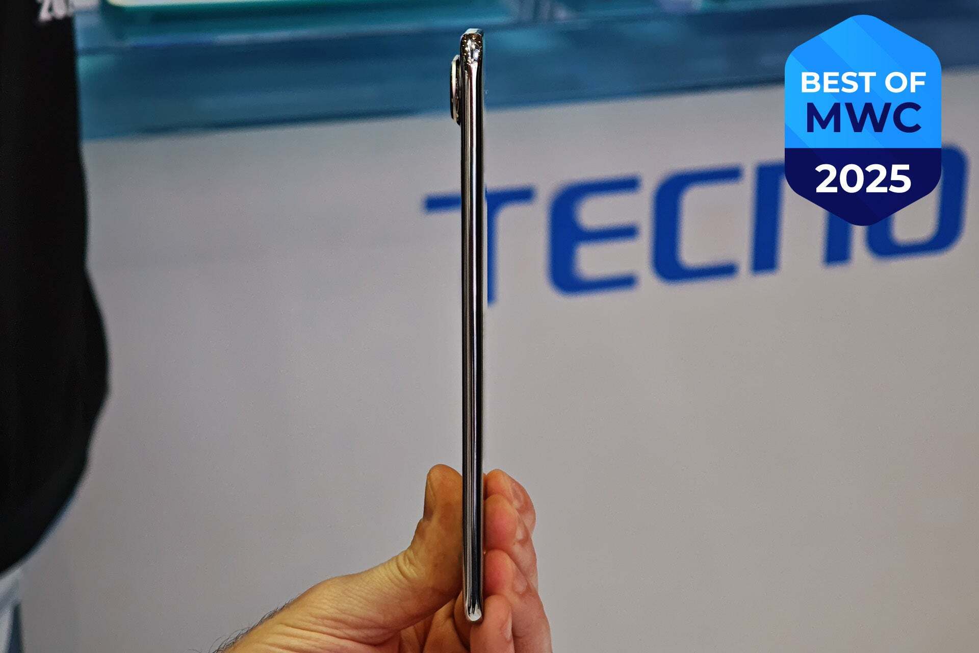 Tecno Spark Slim phone hold by a hand