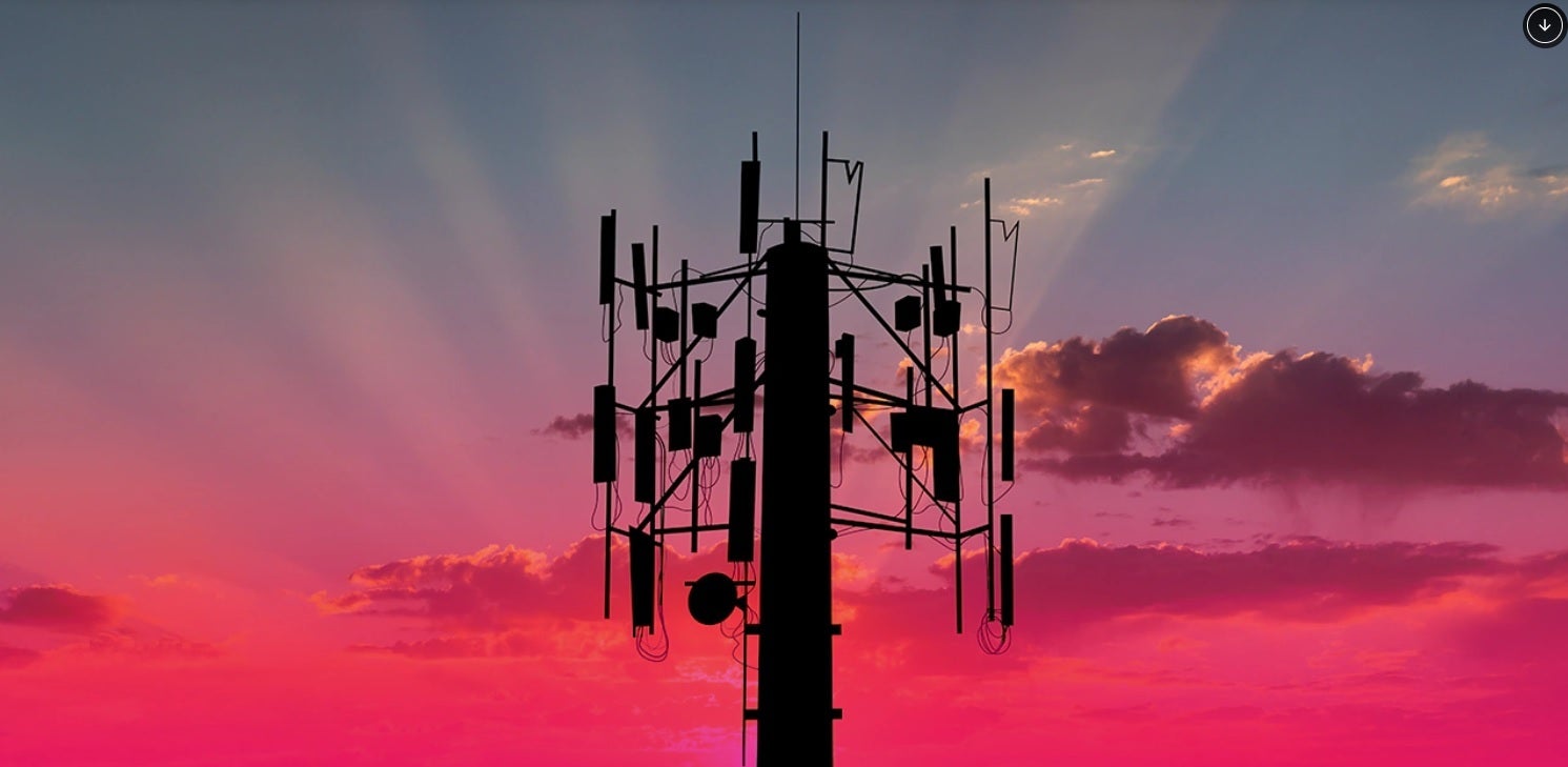 A T-Mobile 5G cell tower is seen during sundown.