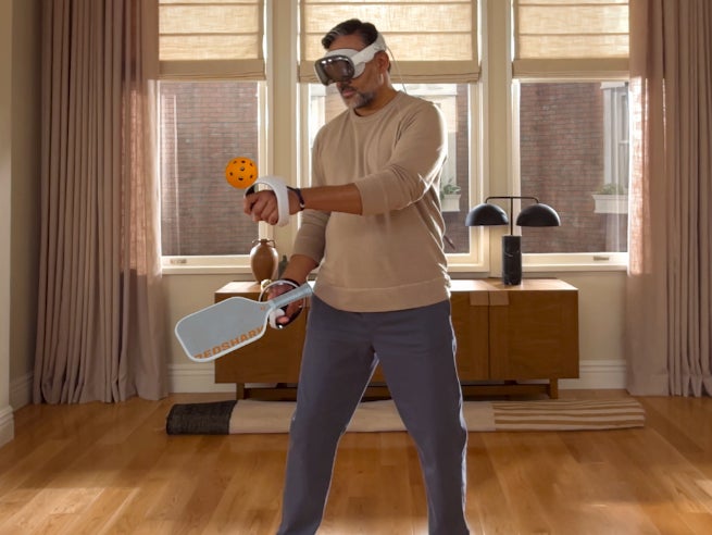 Using PSVR2 controllers with the Vision Pro. | Image credit — Apple - Apple introduces visionOS 26 for Vision Pro, with support for VR games and more