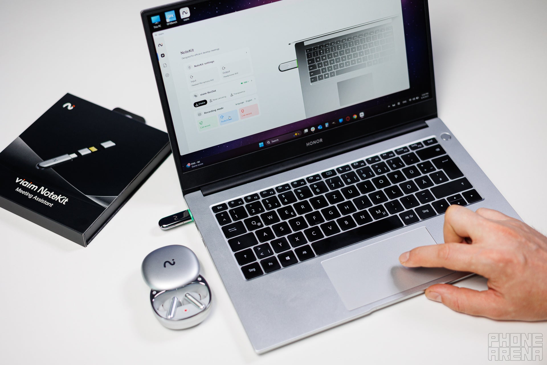A laptop with the Viaim NoteKit plugged in, and the RecDot placed nearby to show the two products working in tandem