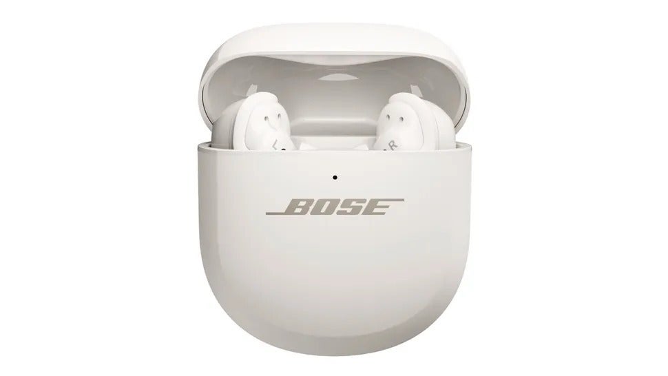 The QuietComfort Ultra Earbuds (2nd Gen) now support wireless charging right out of the box, shown here in White Smoke. | Image Credit — Bose - Bose’s latest earbuds go straight for the AirPods Pro throne