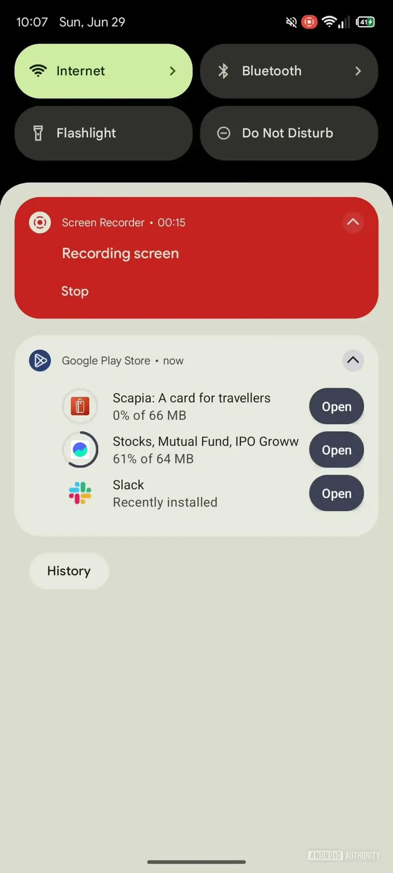 Screenshot of Google Play Store notification with current downloads