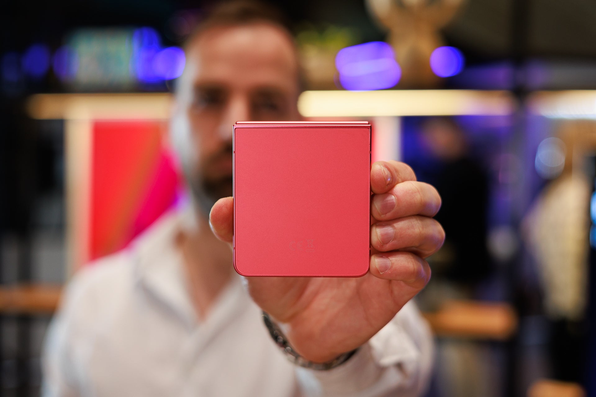 The Z Flip 7 in Coral-red. | Image Credit - PhoneArena - Galaxy Z Flip 7 colors: all the official hues