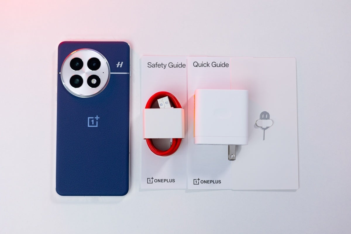 OnePlus 13 with charger and cable