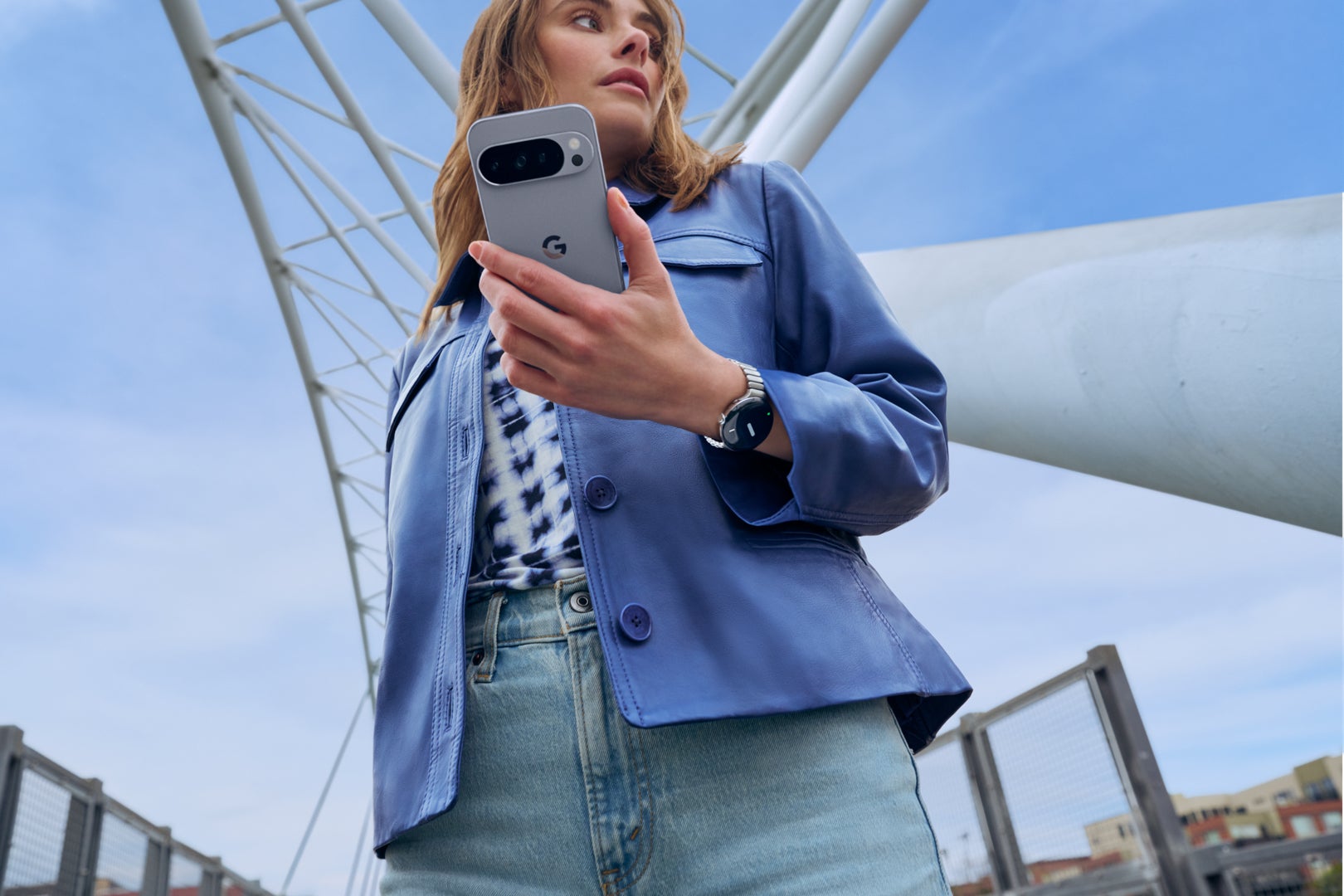 A woman using a Pixel 10 device
