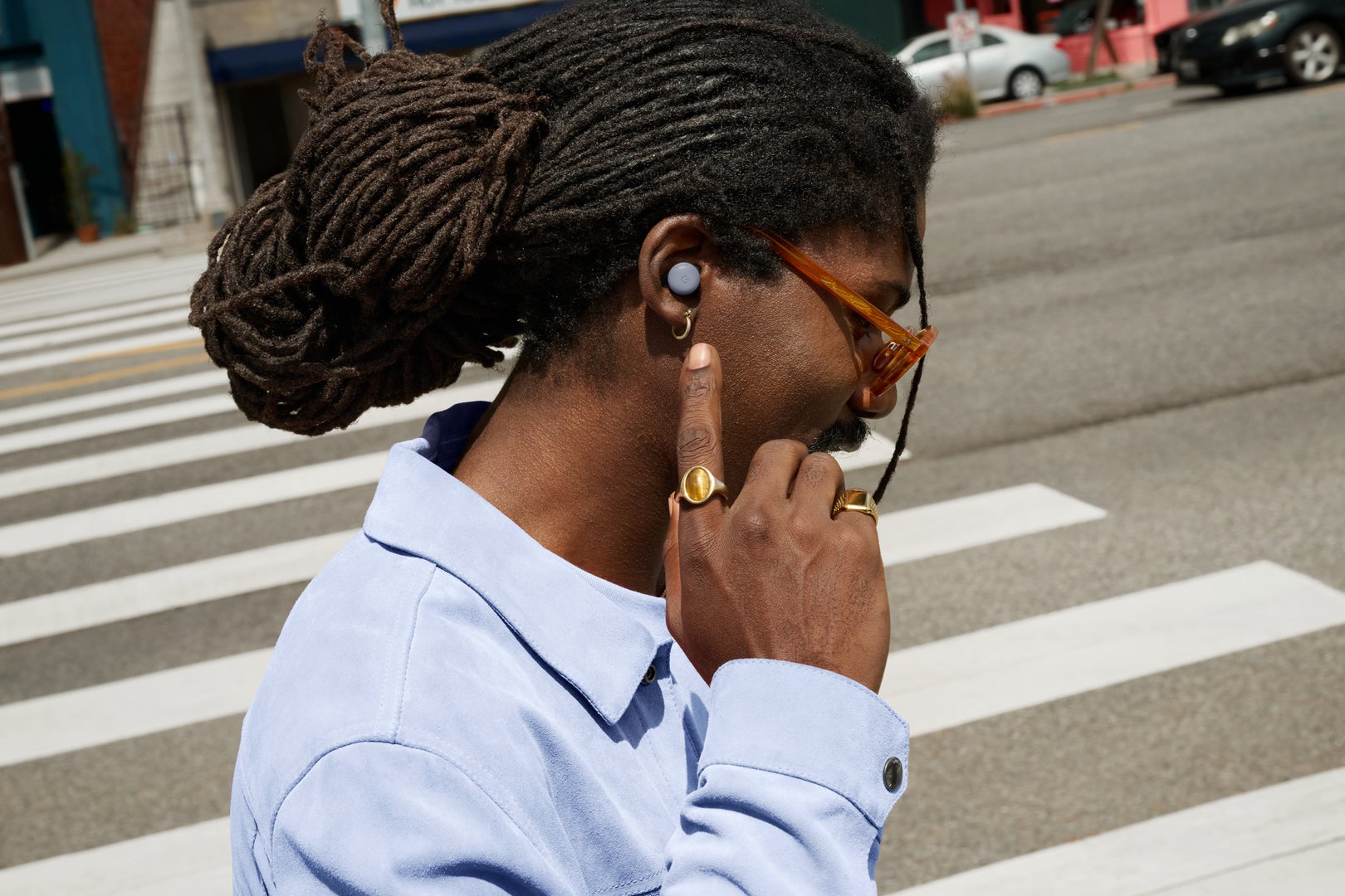 A man using Pixel Buds Pro 2