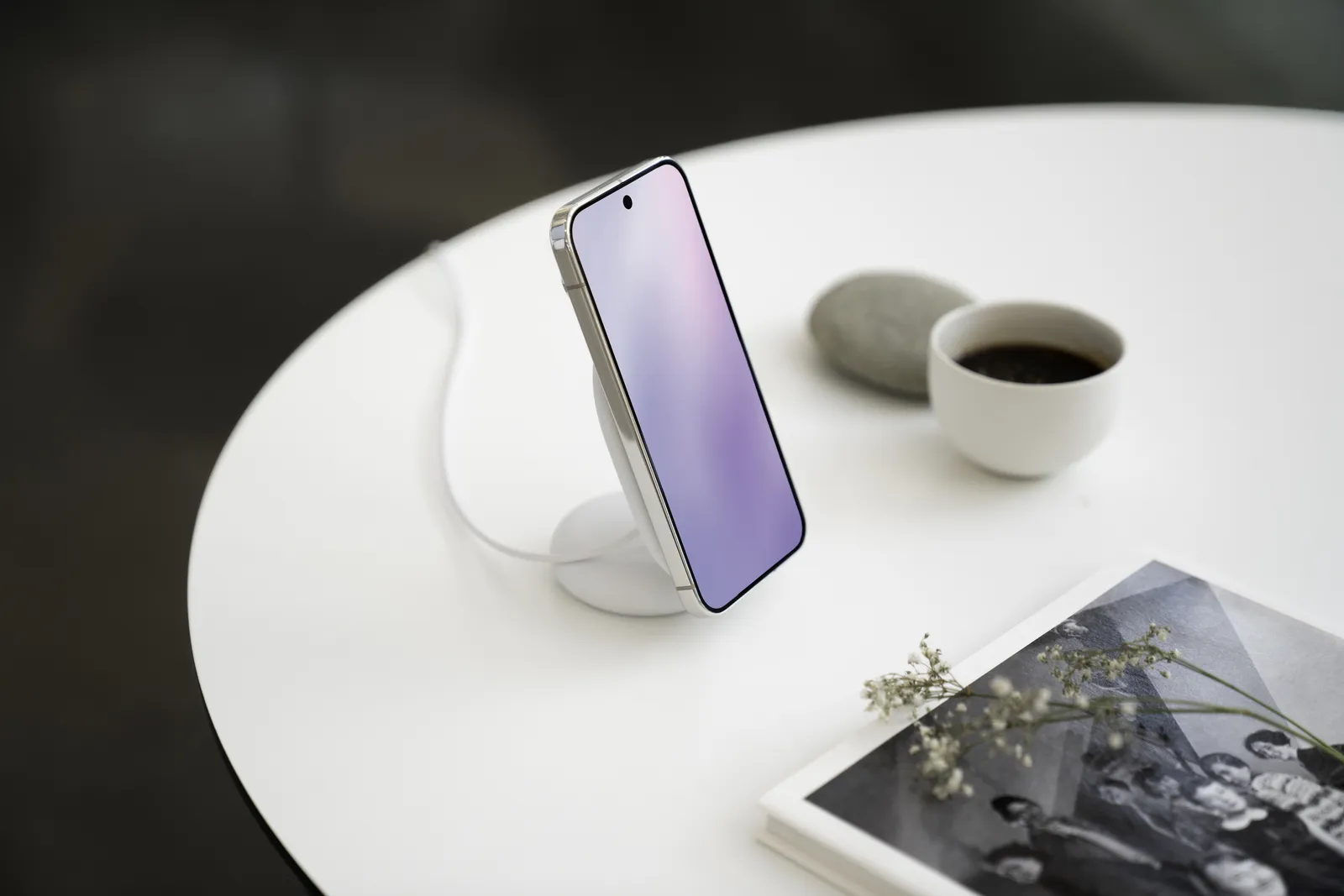 The new Pixelsnap Charger and Stand with a phone on it.