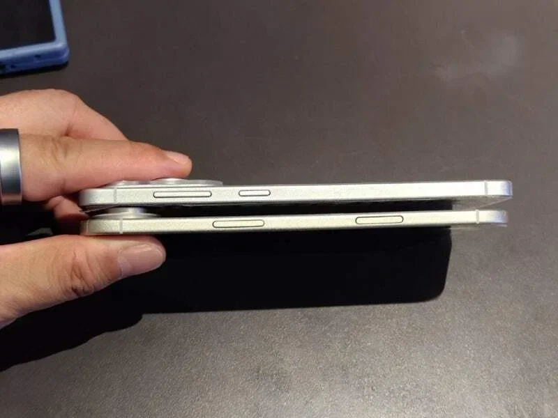 Two phones in profile.