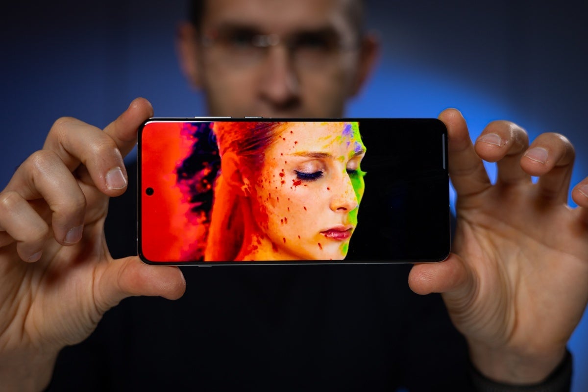 OnePlus 13 in hand