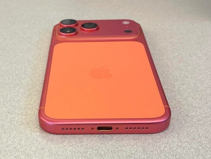 Another angle of iPhone 17 Pro changing colors from Orange to Rose Gold.