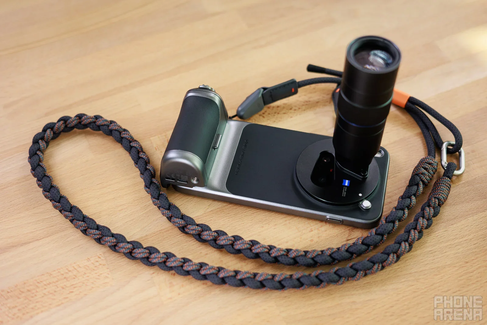 Instead of focusing on polishing the user experience, we see companies pull off pointless stunts like this attachment (Image by PhoneArena) - Every other phone misses what makes iPhone photos feel alive