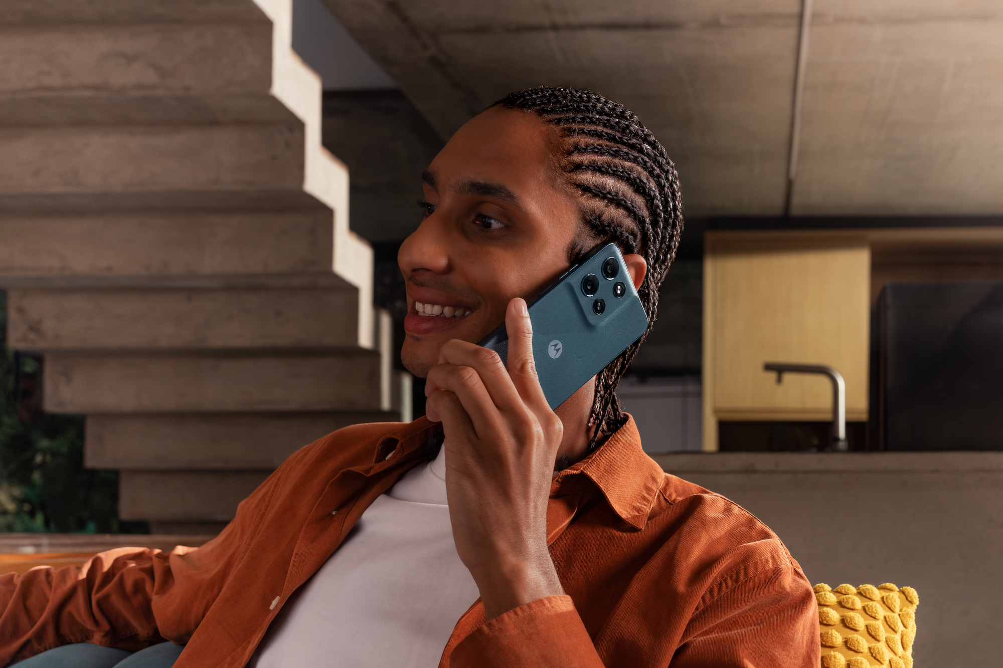 A photo of a person talking on the phone.