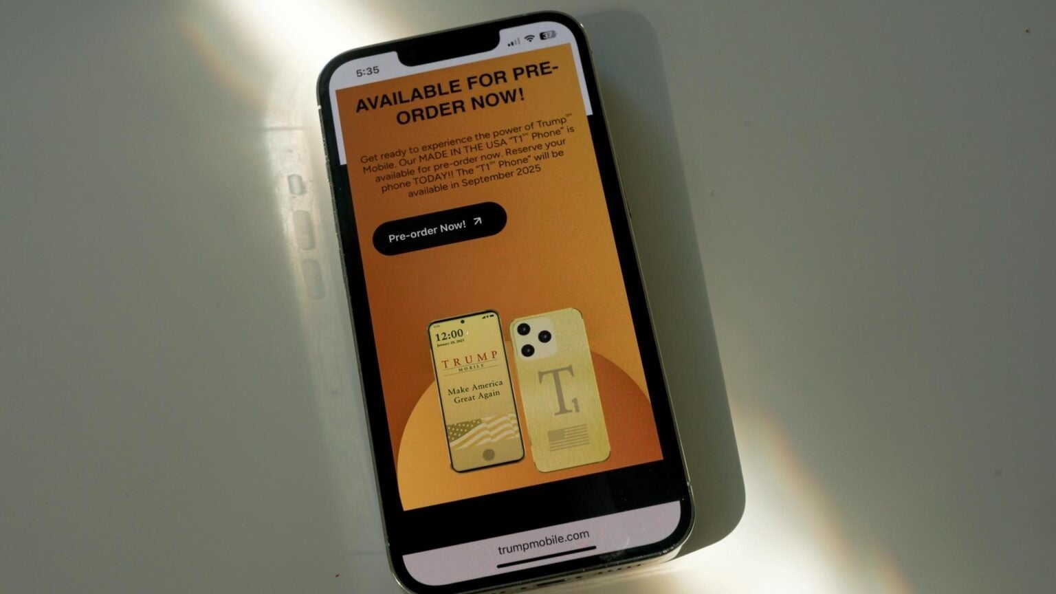 Smartphone displaying the Trump Mobile pre-order webpage.