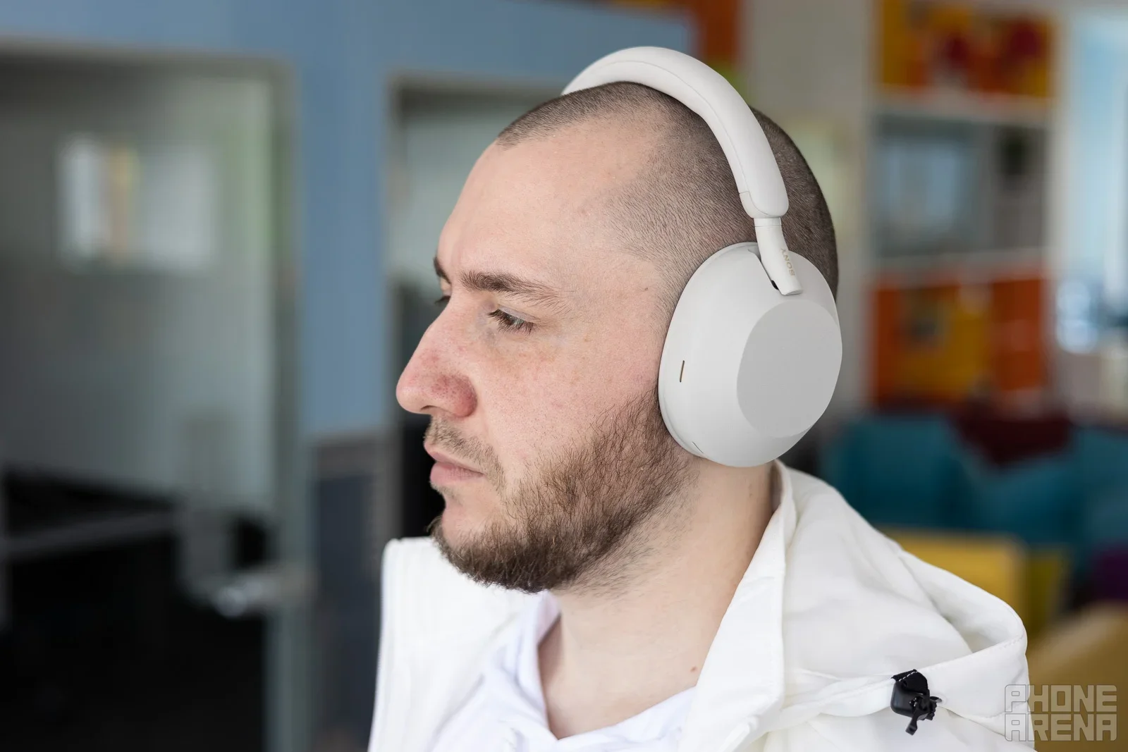 A man with headphones on.