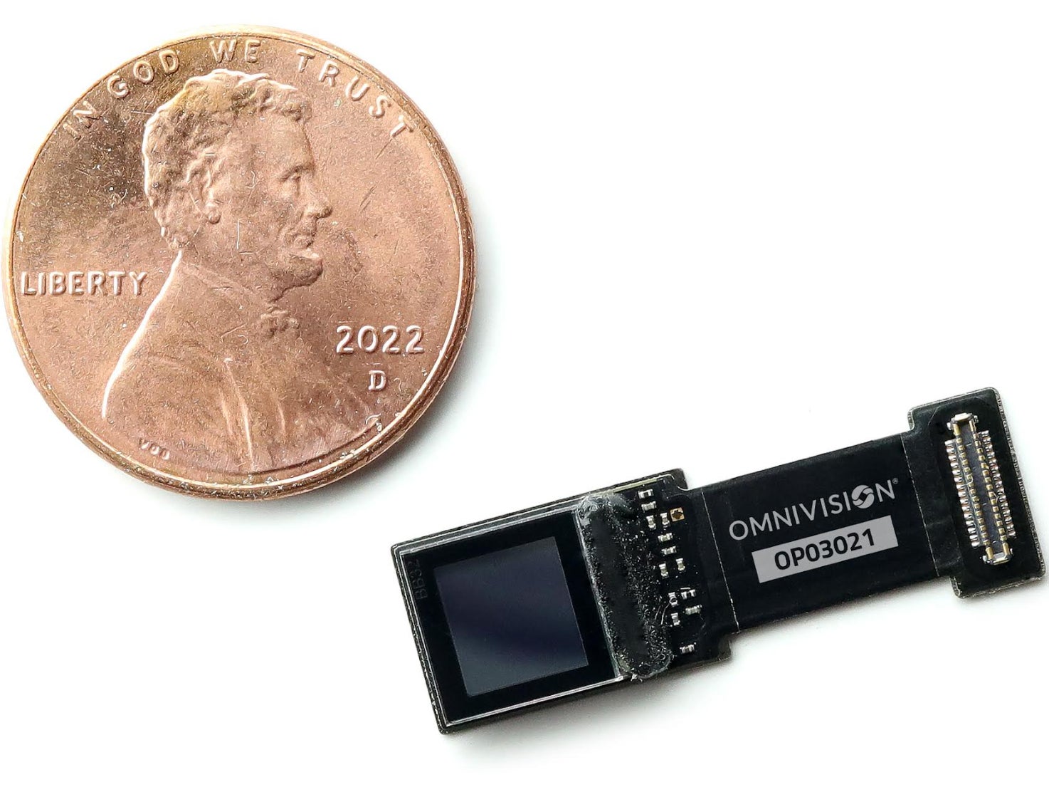 Omnivision AR smart glasses single-chip low-power full-color display size comparison with coin