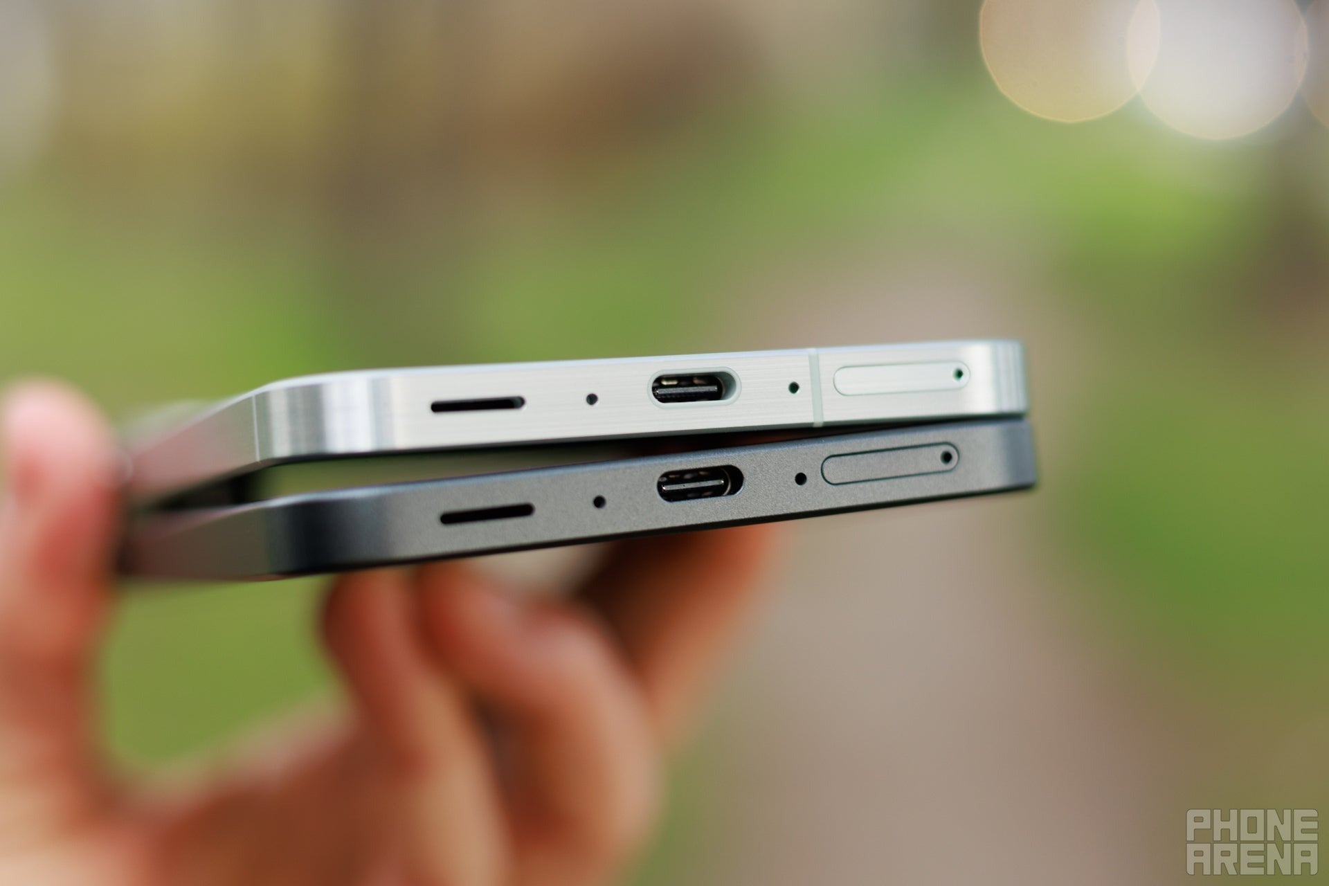 USB-C ports and speaker grilles on two Samsung phones