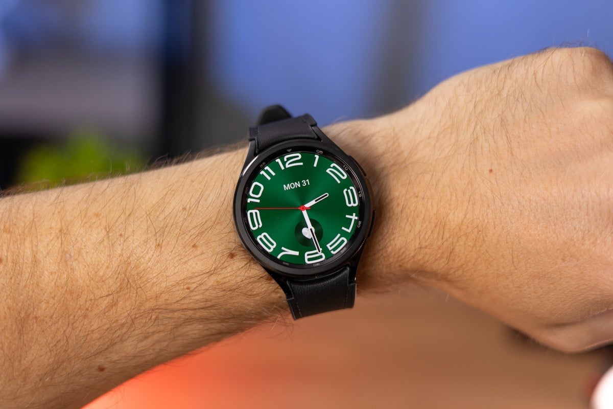 A Samsung Galaxy Watch 6 Classic on a user&amp;#039;s wrist