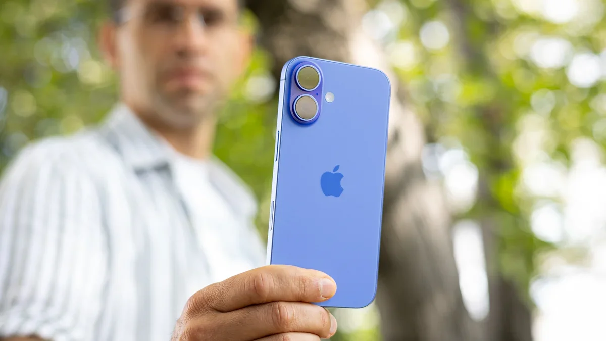 A man looking at a phone.