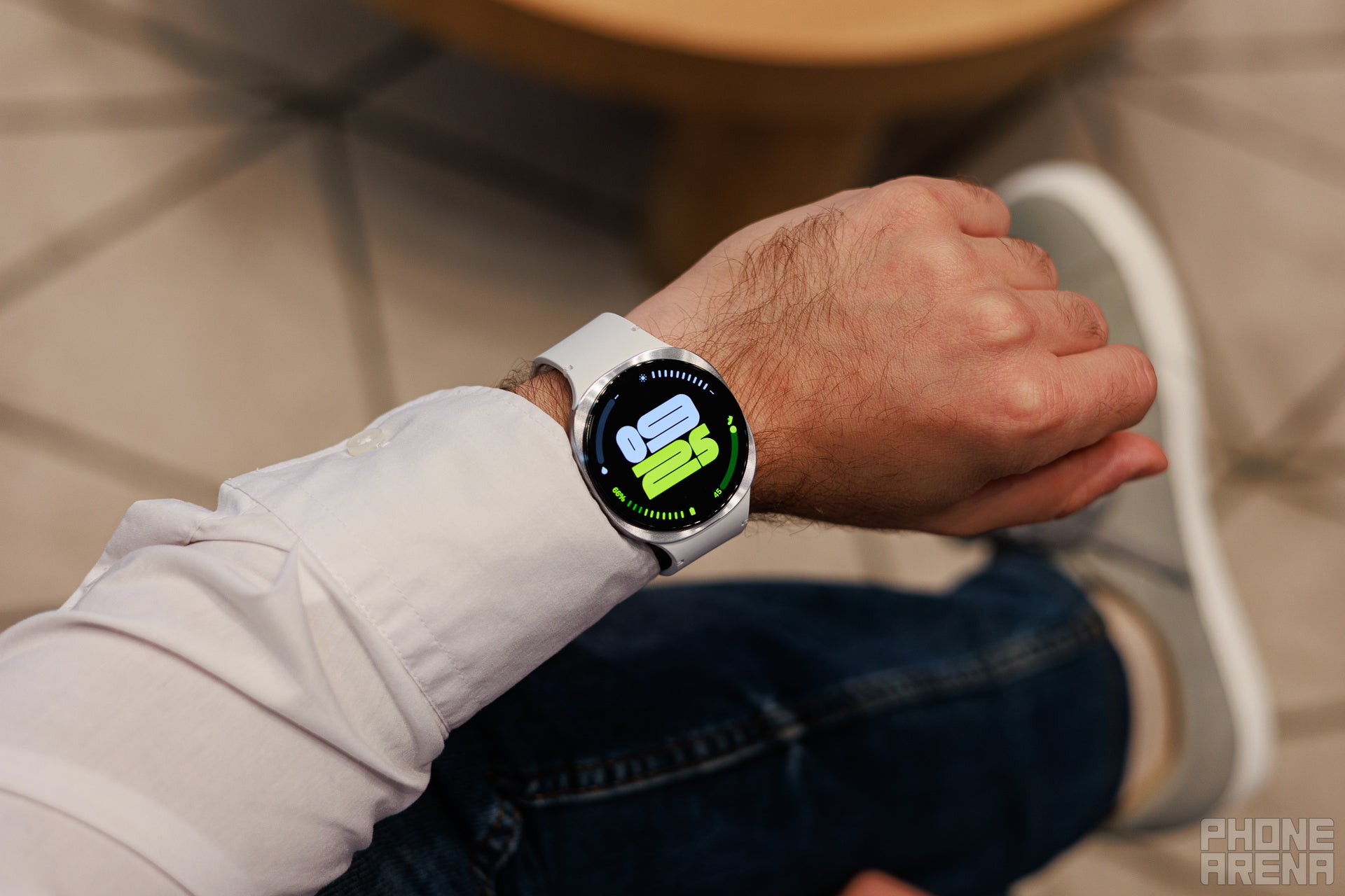 Man wearing a white Galaxy Watch 8.