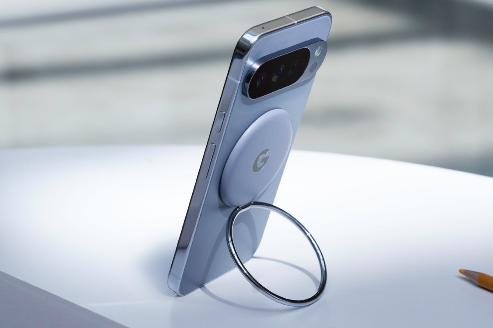 Google Pixel phone with Pixelsnap magnetic ring stand attached to the back