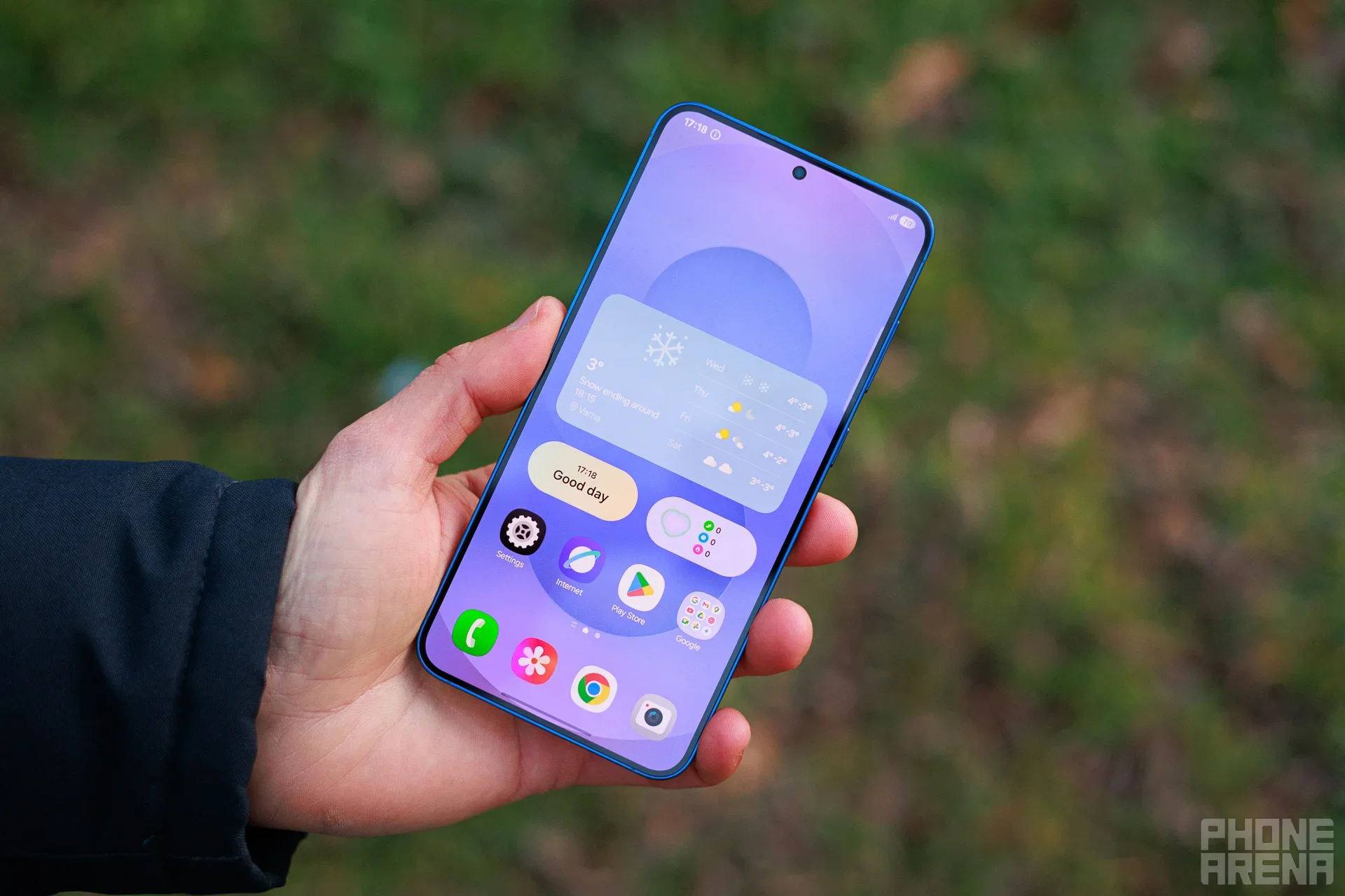 Galaxy S25 Plus held in hand.