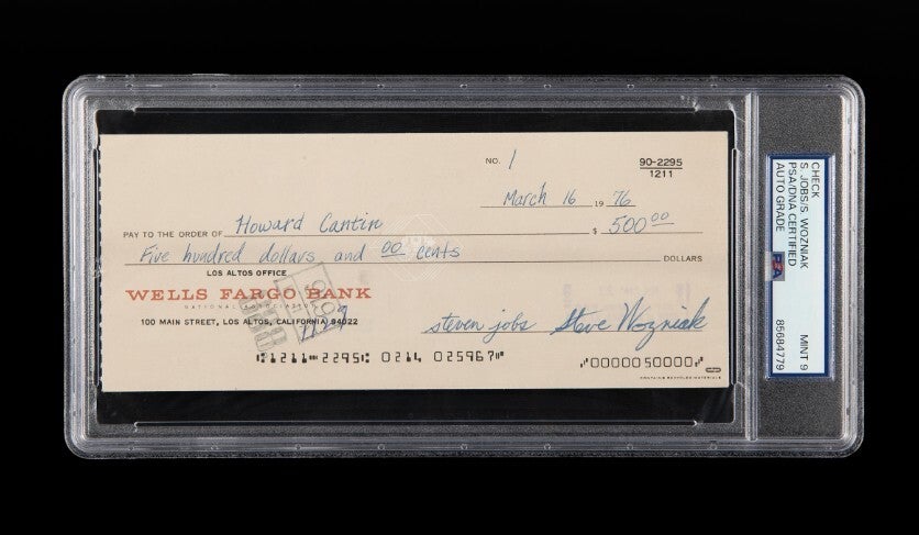 Picture of check number 1 signed by the two Steves.