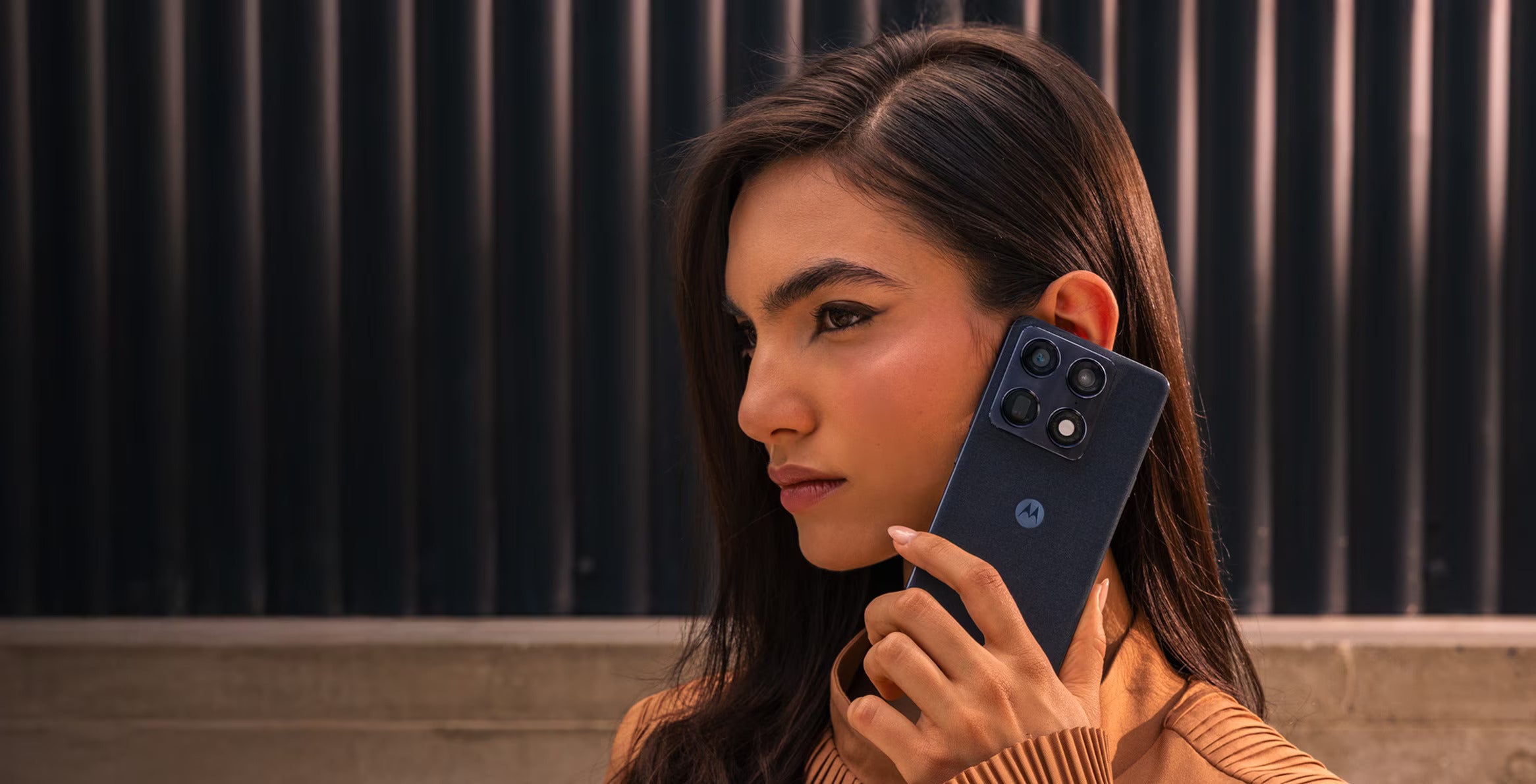 A girl using the Motorola Signature.