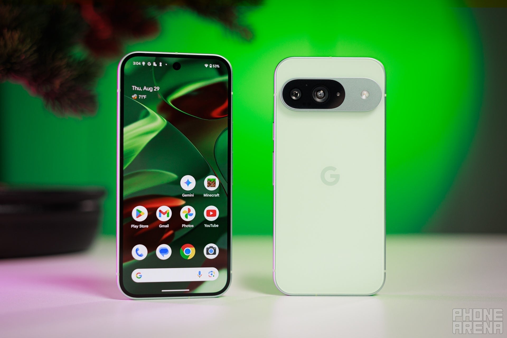 Google Pixel 9 front and back side by side on desk