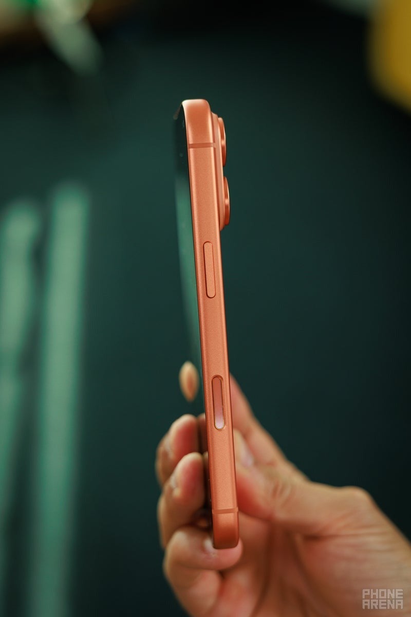iPhone shown from the side highlighting the frame and camera bump