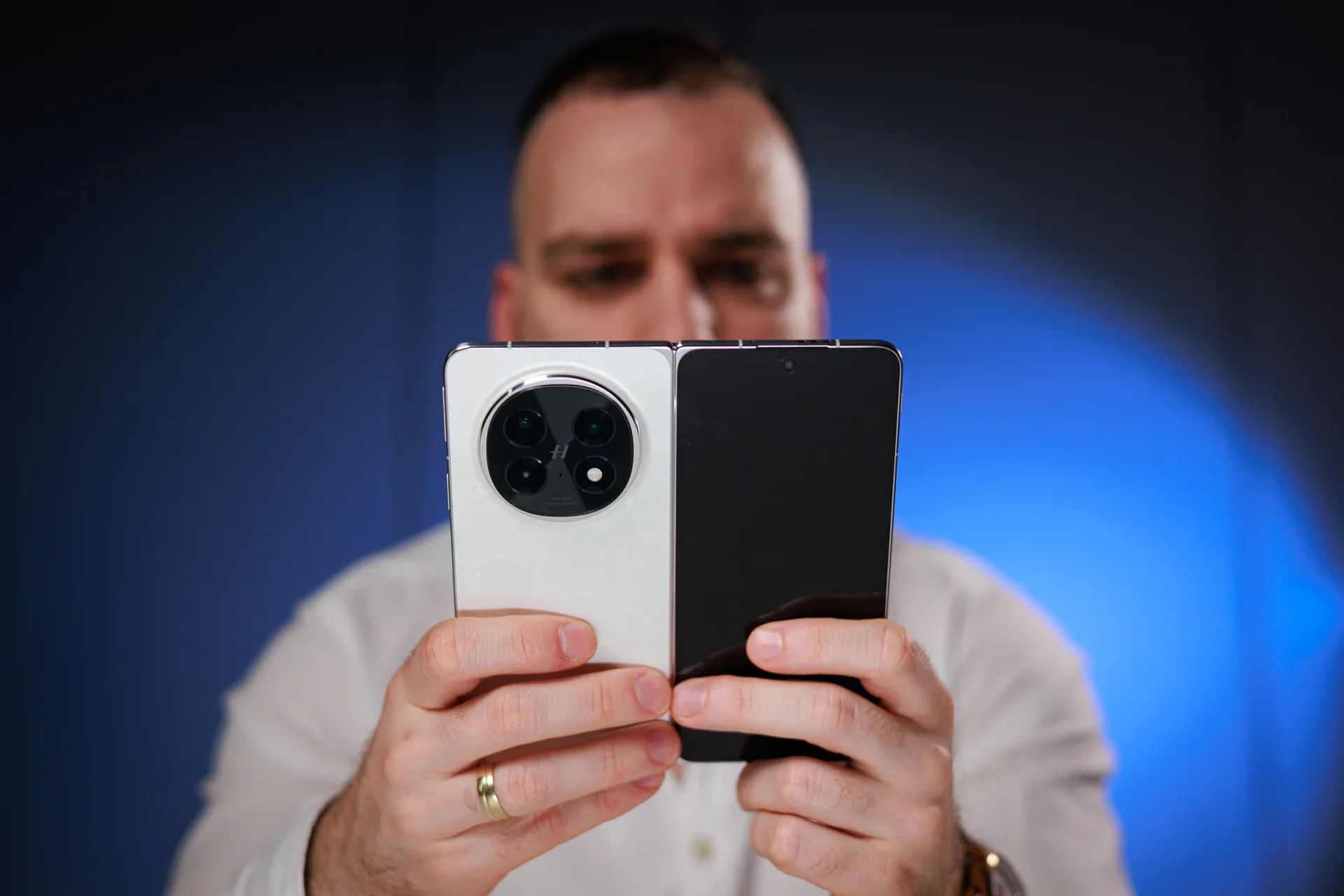 A man with an Oppo phone.