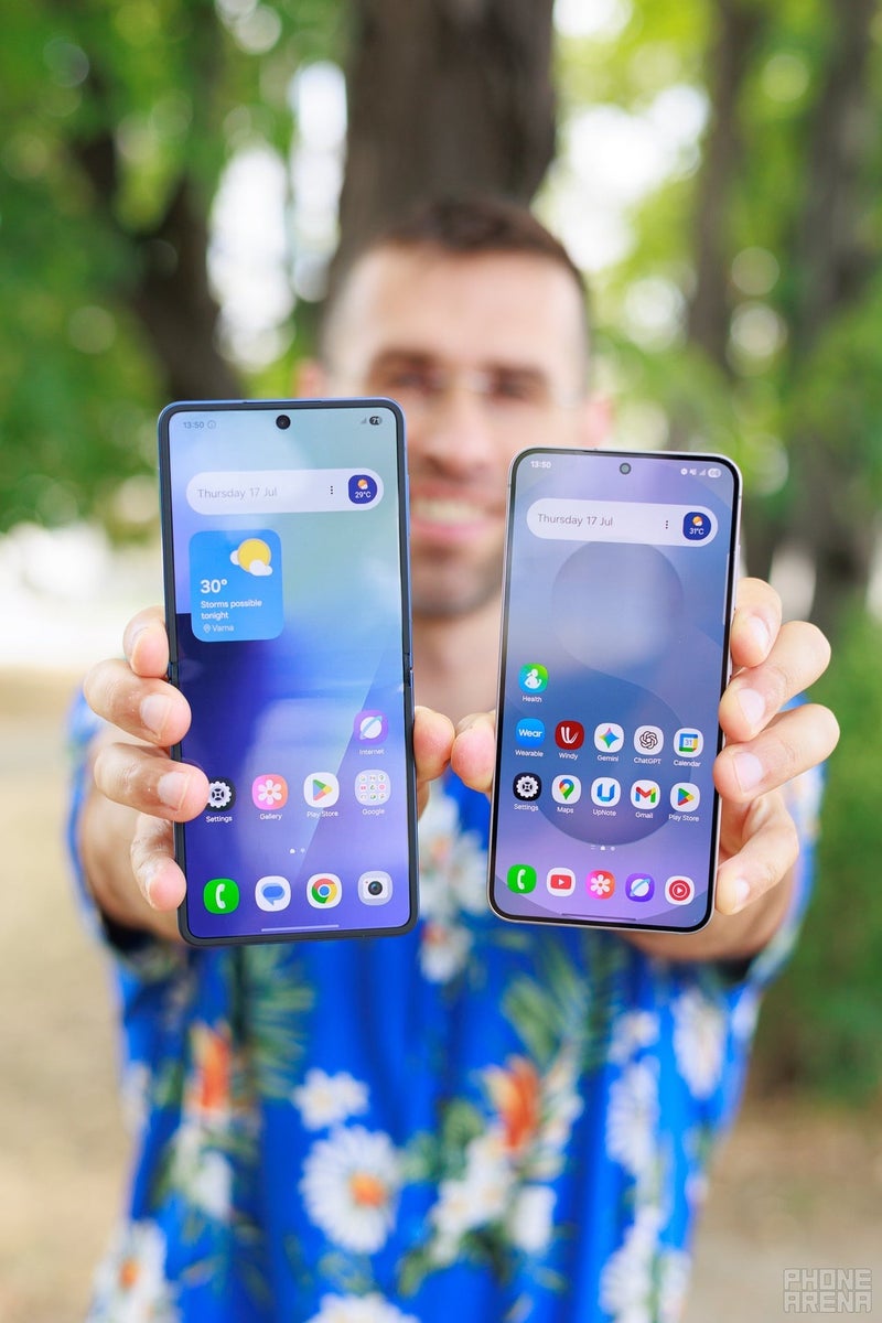 Samsung Galaxy Z Flip 7 and Galaxy S25 held in both hands outdoors