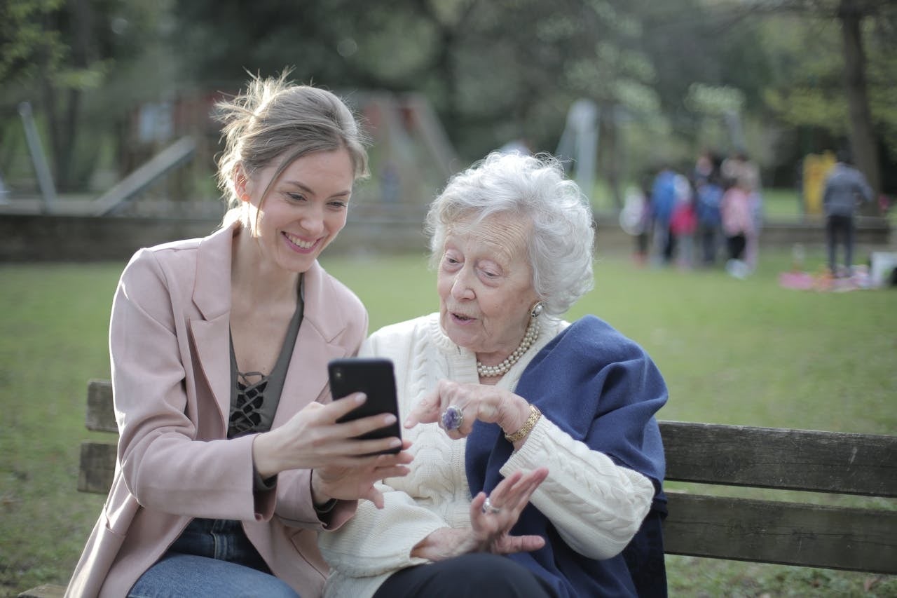 Two women and a phone.