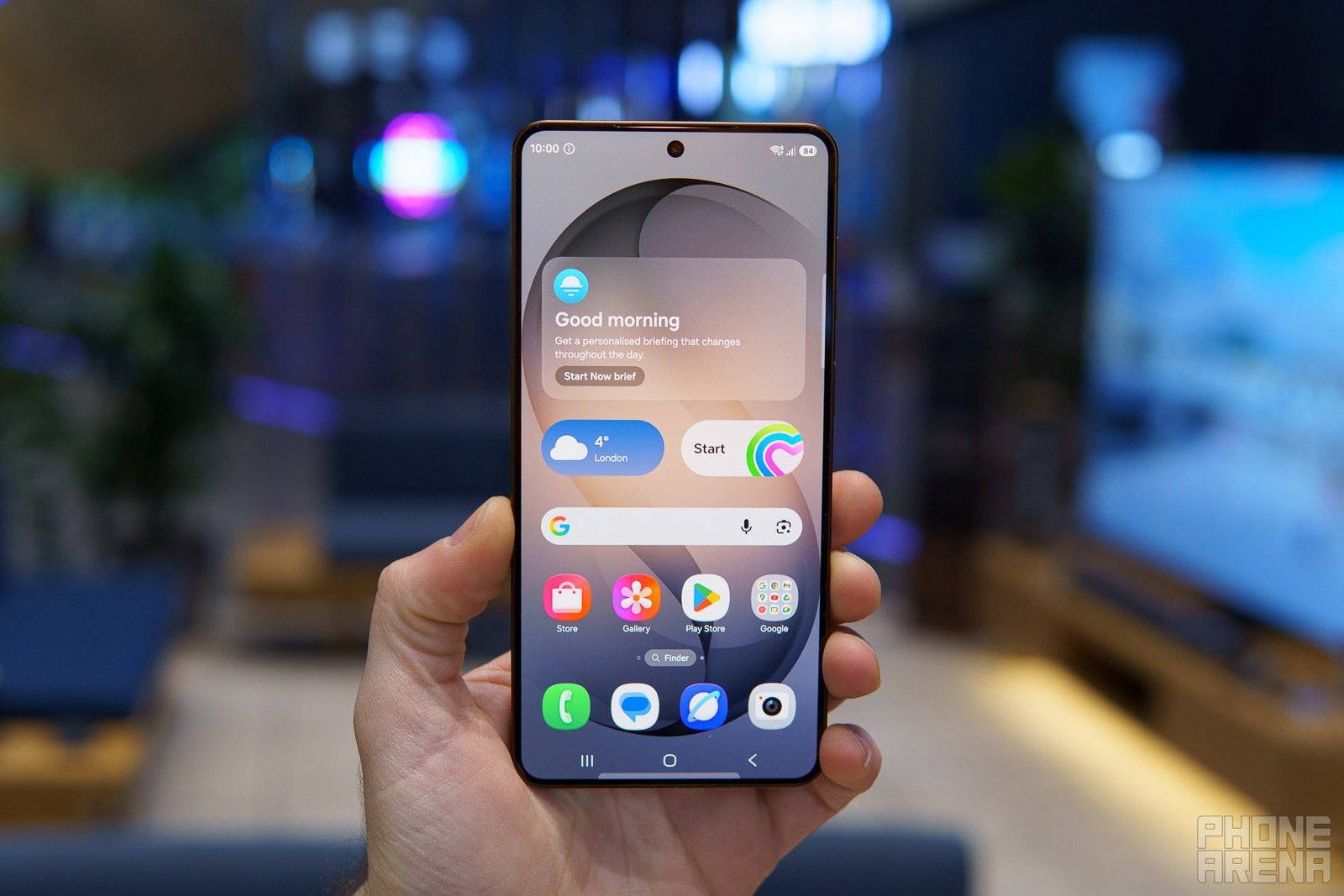 A man holding the Samsung Galaxy S26 Plus.