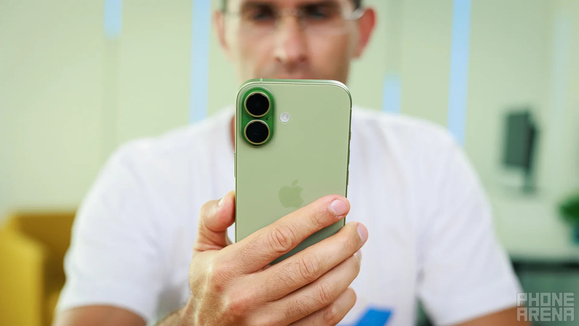 A man with an iPhone.