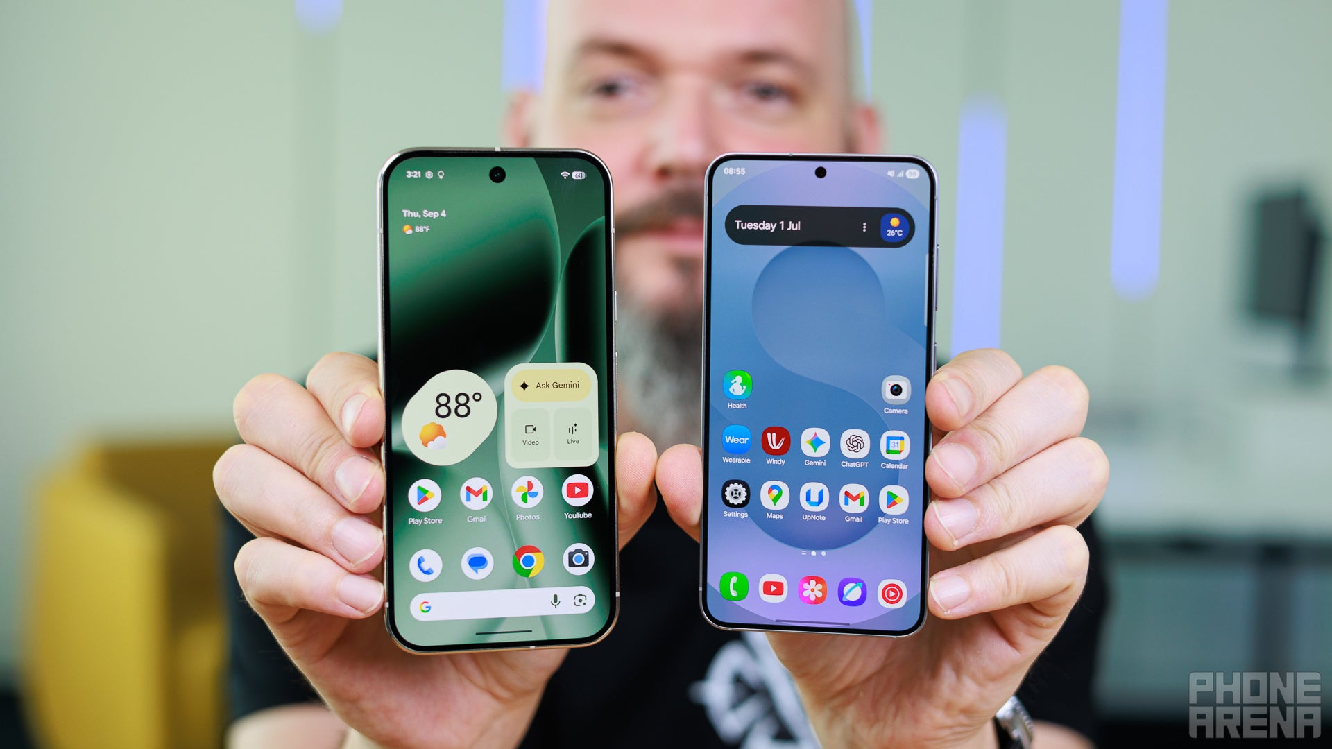 A man holding Pixel 10 and Samsung Galaxy S25.