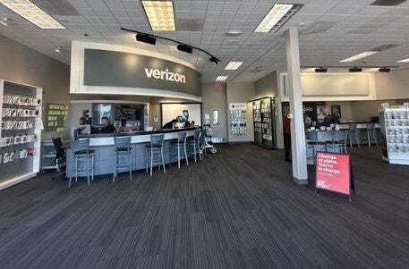 Inside a Verizon store at a shopping mall.