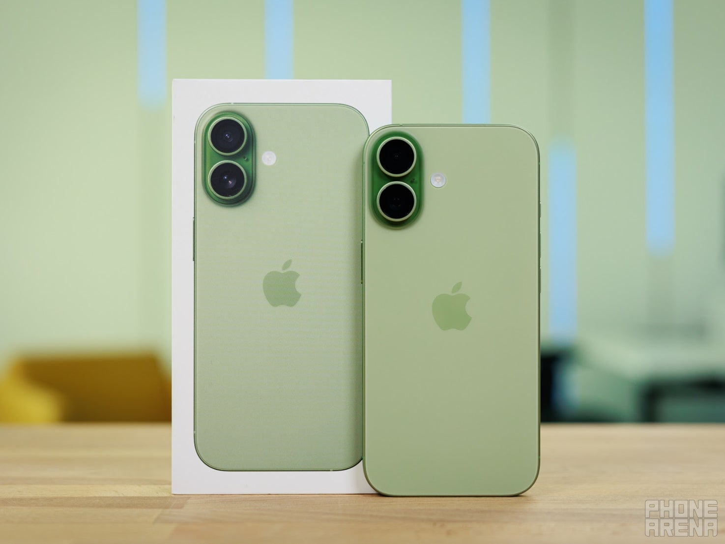 Green base iPhone 17 with box