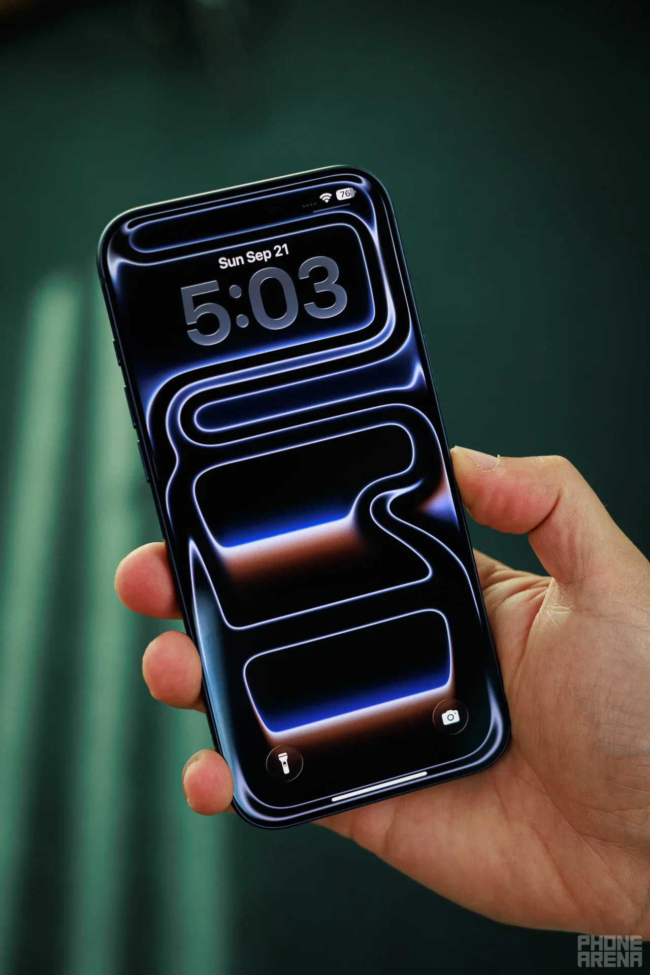 iPhone in hand.
